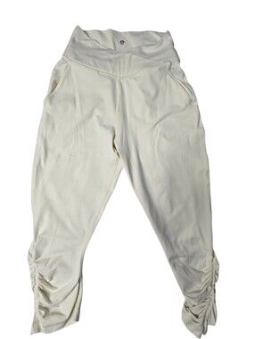 lululemon Athletica Sunset Salutation Crop leggings in a light beige or cream